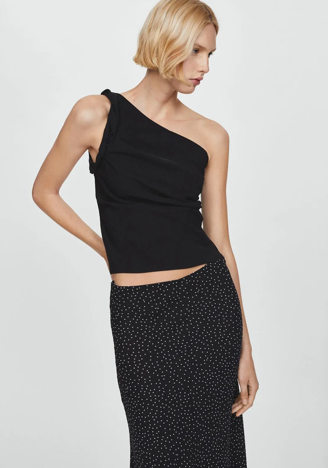 Polka-dot asymmetric skirt