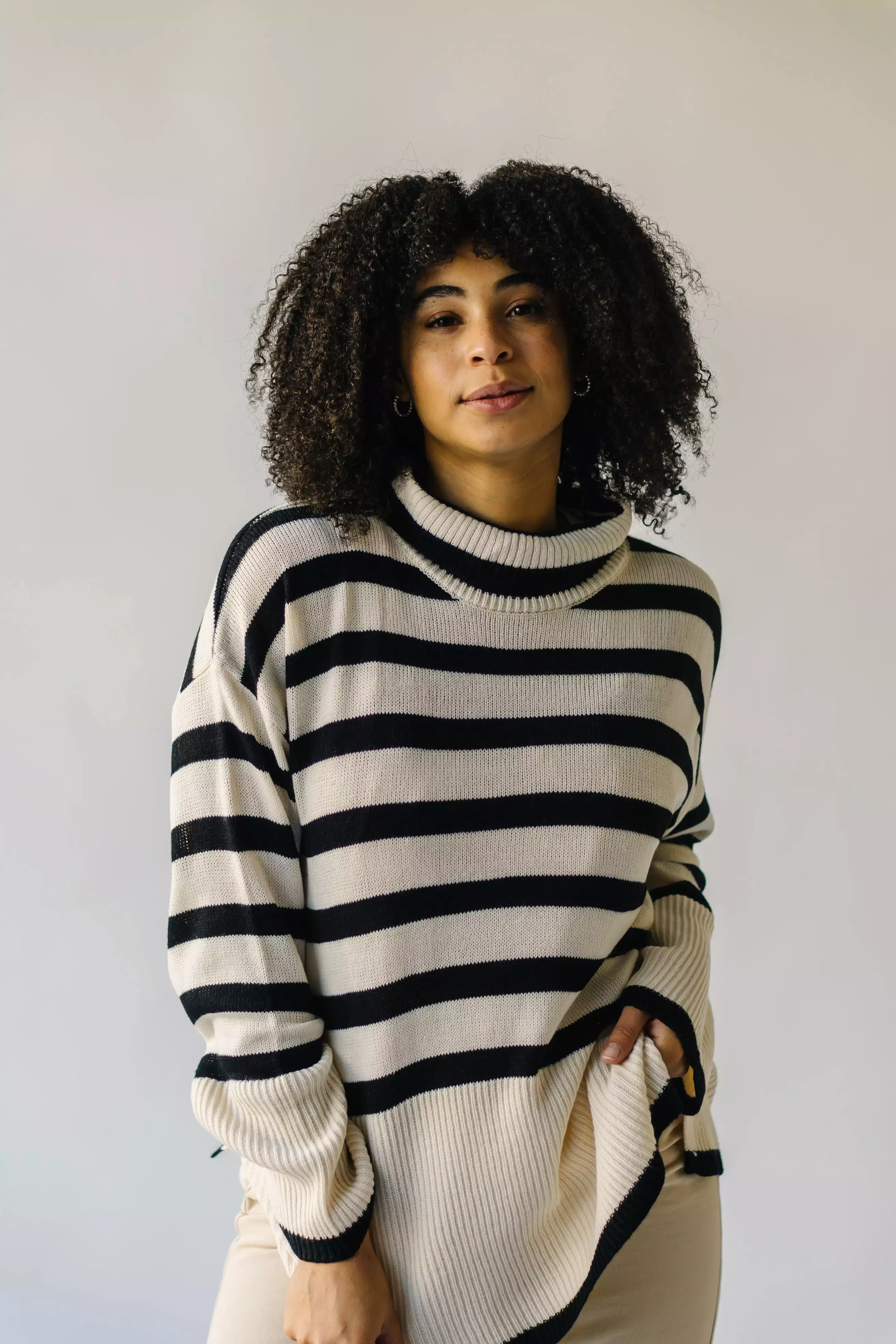 The Bryson Striped Turtleneck Sweater in Cream + Black