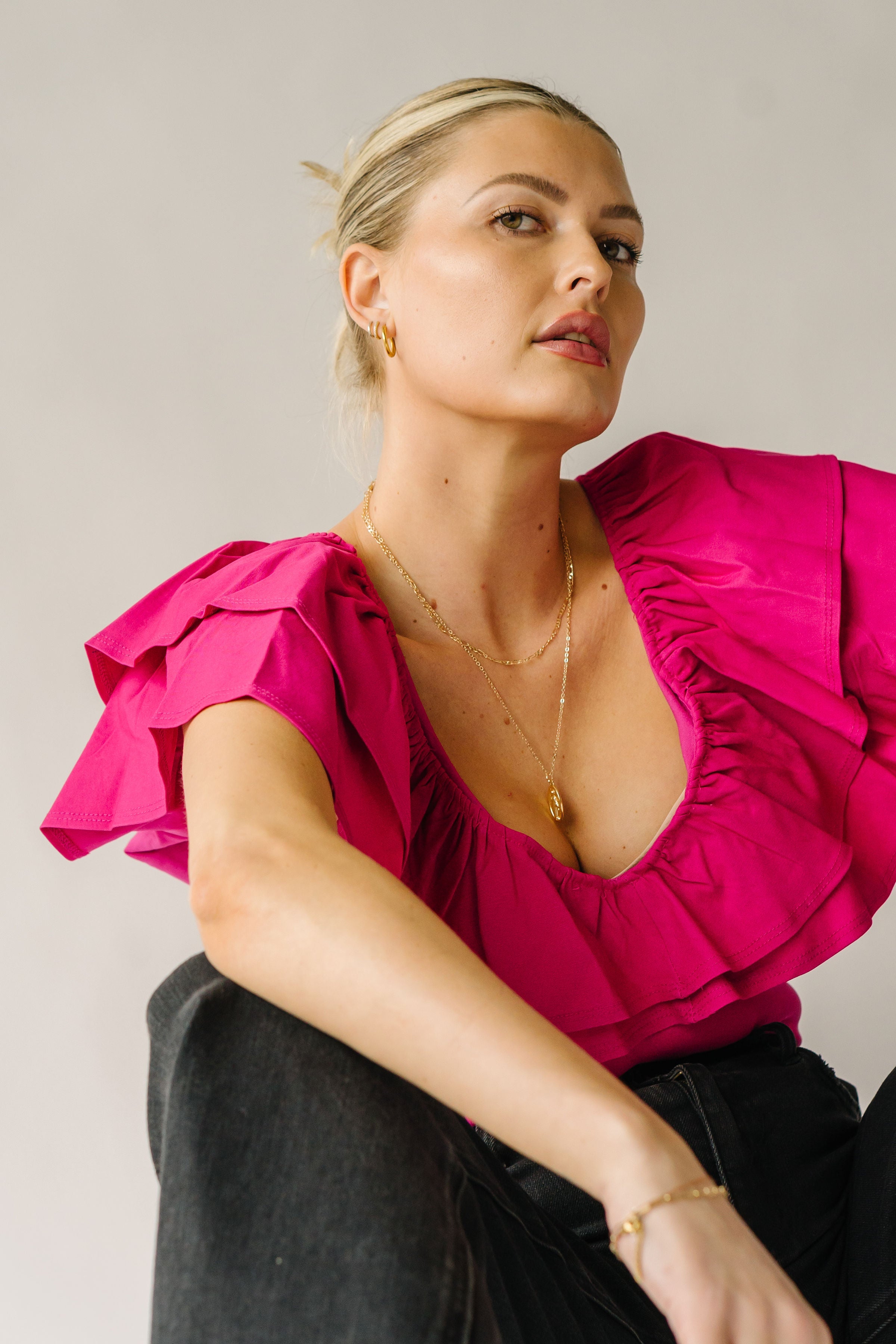 The Pedersen Ruffle Bodysuit in Magenta